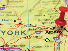 New York State map with a push pin in Albany
