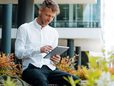 Person using tablet outside of office