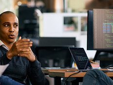 Coworkers discussing solutions at the office