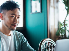 Person using laptop at home